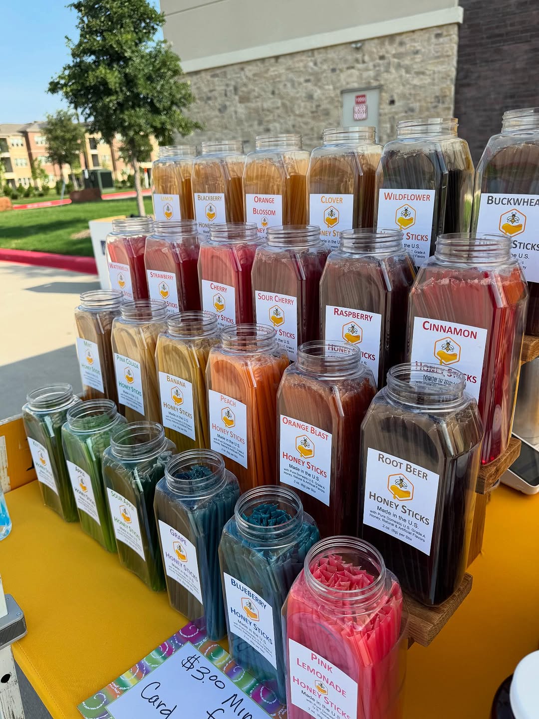 Rainbow of honey sticks in 24 crazy flavors