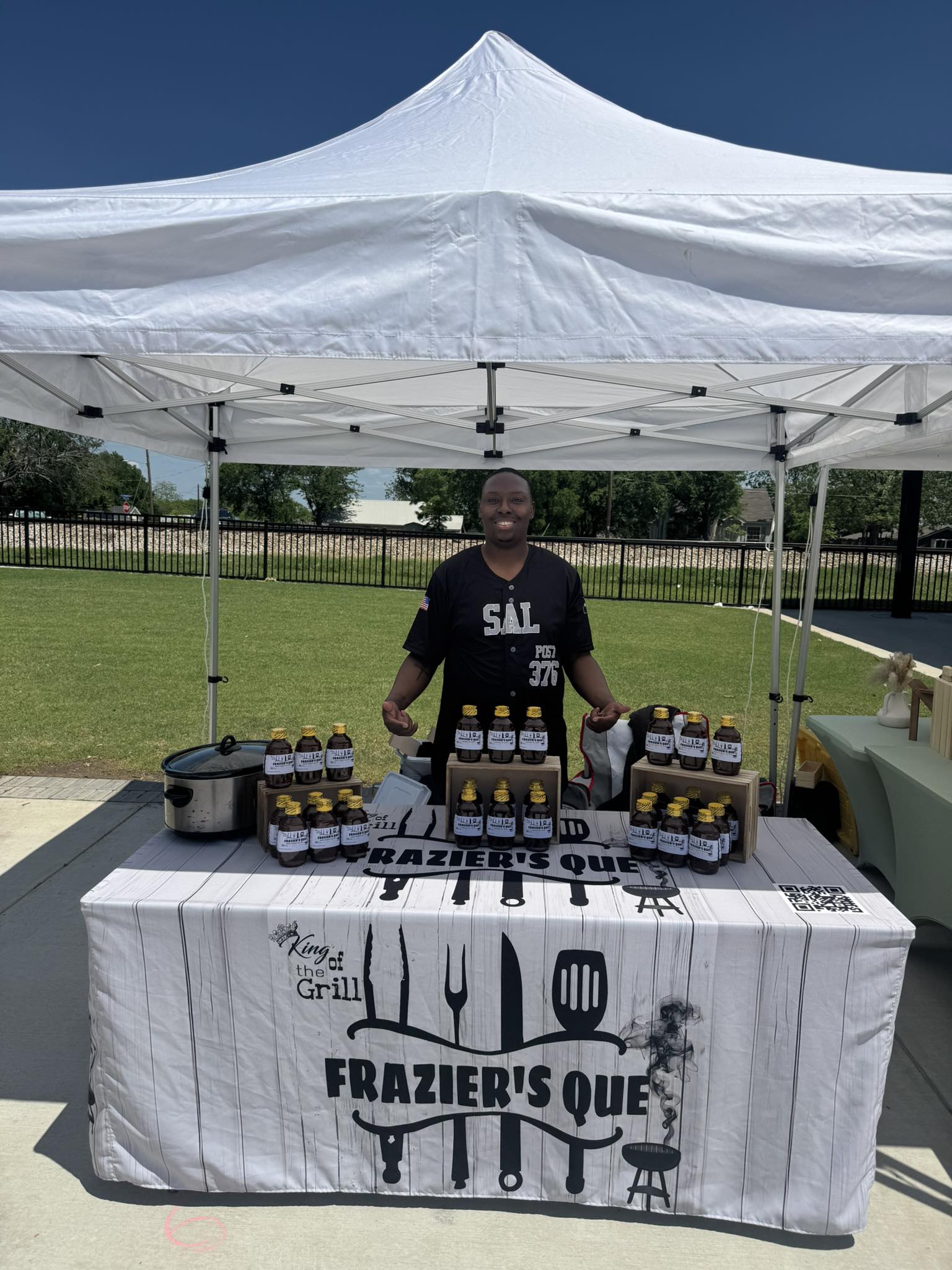 Frazier's Que booth set up at Melissa Farmers Market